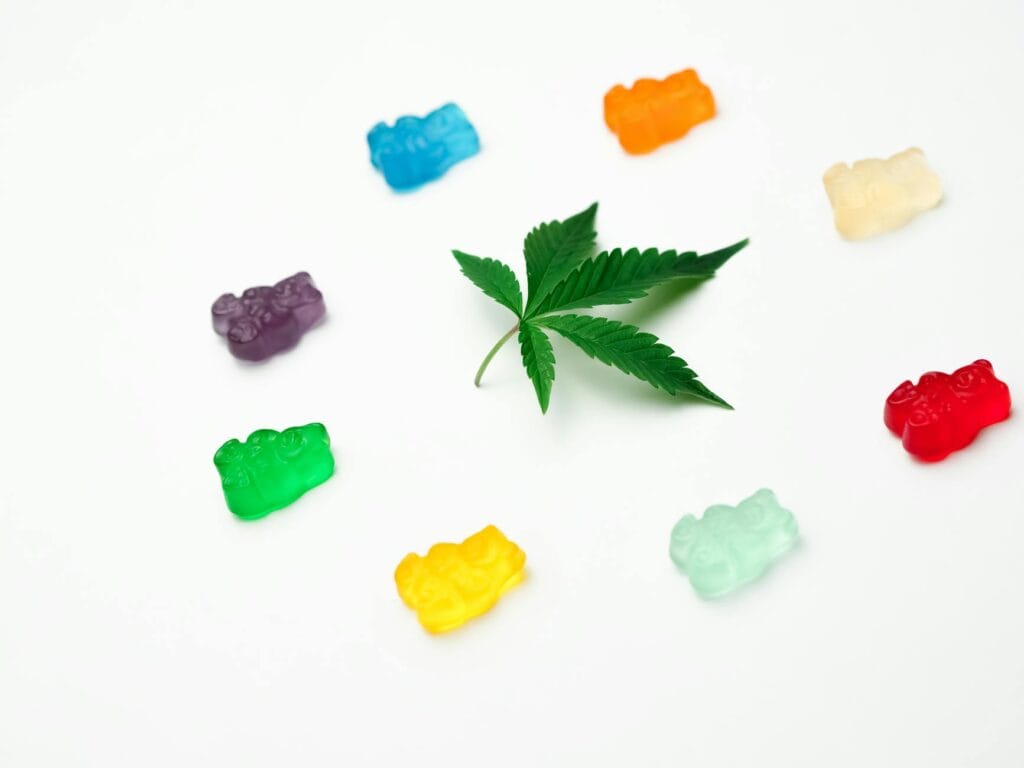 photo assorted colored gummy bears on white background